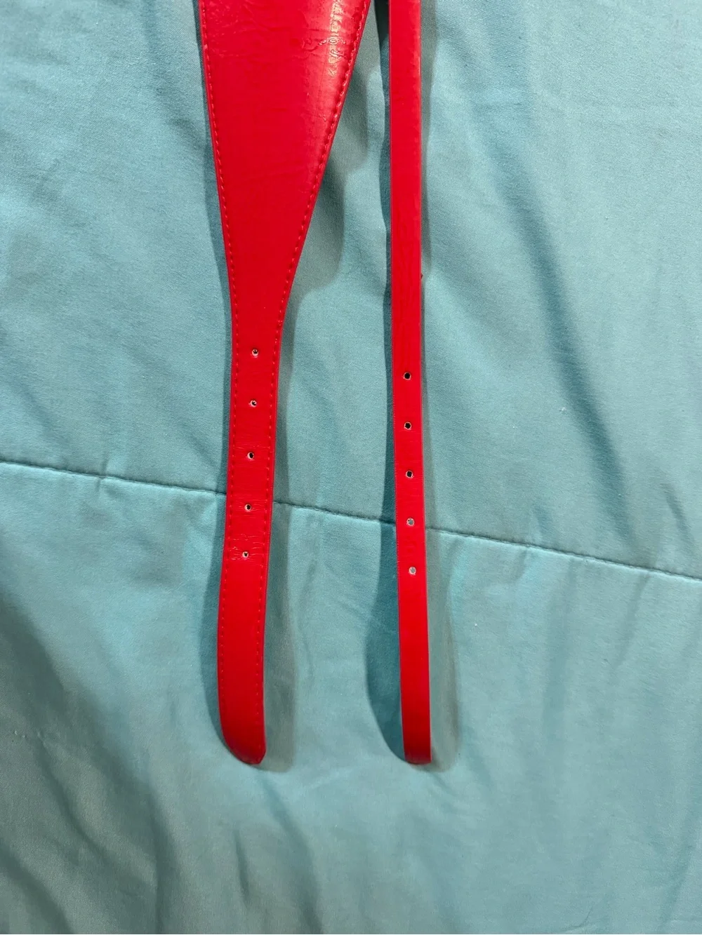 Two belts in one — one wide and one narrow.